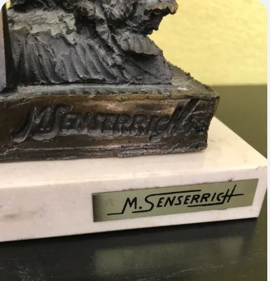 Statuie semnata M. Senserrich, reprezentand un tanar la munca campului