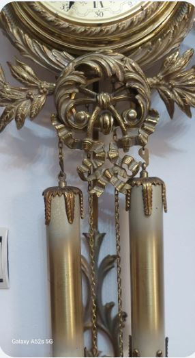 Frumoasa pendula de perete din bronz